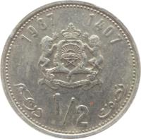 Morocco coin 1/2 Dirham - Hassan II - 3'rd Portrait (1987) reverse reverse of 1/2 Dirham - Hassan II - 3'rd Portrait (1987) coin with Y# 87 from Morocco. Inscription: 1987 1407 نصف 1/2 درهم