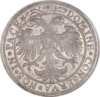 Swiss cantons coin 1 Thaler (1556) reverse reverse of 1 Thaler (1556) coin with DAV# 8783 from Swiss cantons. Inscription: DOMINE*CONSERVA*NOS*IN*PACE*