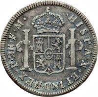 Colombia coin 2 Reales - Fernando VII (1810 - 1820) reverse reverse of 2 Reales - Fernando VII (1810 - 1820) coin with KM# 70 from Colombia. Inscription: · HISPAN · ET IND · REX · N · R · 2R · and assayers F · J