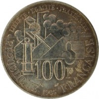 reverse of 100 Francs - Germinal (1985) coin with KM# 957 from France. Inscription: LIBERTE · EGALITE · FRATERNITE 100F le breton RÉPUBLIQUE 1985 FRANÇAISE