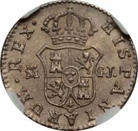 reverse of 1/2 Real - Fernando VII (1812 - 1814) coin with KM# 473 from Spain. Inscription: HISPANIARIUM. REX. M G.J.