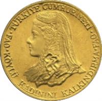 obverse of 500 Lira - FAO (1979) coin with KM# 930 from Turkey. Inscription: TÜRKİYE CUMHURİYETİ FAO ◦ KÖYLÜ KADININI KALKINDIRMA ◦ FAO