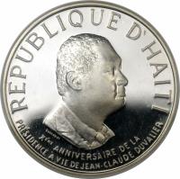 obverse of 100 Gourdes - Anniversary of presidency (1981) coin with KM# 158 from Haiti. Inscription: REPUBLIQUE D'HAITI SOCCORSI XEME ANNIVERSAIRE DE LA PRESIDENCE A VIE DE JEAN CLAUDE DUVALLER