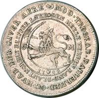 Denmark coin 1 Riksdaler - Frederik IV (1704) reverse reverse of 1 Riksdaler - Frederik IV (1704) coin with KM# 479 from Denmark. Inscription: MOD.TROSKAB.DAPPERHED.OG HVAD DER GIVER AERE DEN HEELE VERDEN KAND. BLANT NORSKE KLIPPER LARE 6 M. 1704