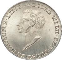 German States coin 1/2 Taler - Georg Wilhelm (1821) obverse obverse of 1/2 Taler - Georg Wilhelm (1821) coin with KM# 34 from German States. Inscription: GEORG WILH. REG. FÜRST ZU SCHAUMB. LIPPE ETC.