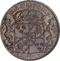 reverse of 1 Riksdaler - Karl XII (1707) coin with KM# 336 from Sweden. Inscription: Med.Gudz.Hielp L.C. 1707.