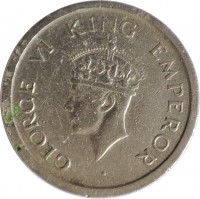 India coin 1 Rupee - George VI (1947) obverse obverse of 1 Rupee - George VI (1947) coin with KM# 559 from India. Inscription: GEORGE VI KING EMPEROR