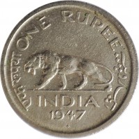 India coin 1 Rupee - George VI (1947) reverse reverse of 1 Rupee - George VI (1947) coin with KM# 559 from India. Inscription: एक रूपया ONE RUPEE یک روپیہ INDIA 1947