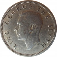 obverse of 1 Shilling - George VI (1948 - 1952) coin with KM# 17 from New Zealand. Inscription: KING GEORGE THE SIXTH