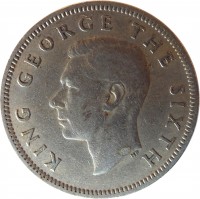 New Zealand coin 1 Shilling - George VI (1948 - 1952) obverse obverse of 1 Shilling - George VI (1948 - 1952) coin with KM# 17 from New Zealand. Inscription: KING GEORGE THE SIXTH