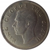 New Zealand coin 1 Florin - George VI (1948 - 1951) obverse obverse of 1 Florin - George VI (1948 - 1951) coin with KM# 18 from New Zealand. Inscription: KING GEORGE THE SIXTH
