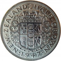 New Zealand coin 1/2 Crown - George VI (1947) reverse reverse of 1/2 Crown - George VI (1947) coin with KM# 11a from New Zealand. Inscription: NEW · ZEALAND HALF · CROWN · 1947 ·