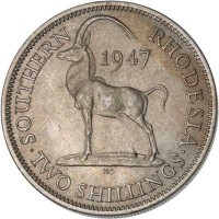 Southern Rhodesia coin 2 Shillings - George VI (1947) reverse reverse of 2 Shillings - George VI (1947) coin with KM# 19b from Southern Rhodesia. Inscription: SOUTHERN RHODESIA 1947 · TWO SHILLINGS ·