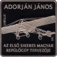 reverse of 1000 Forint - 125th Anniversary to Birth of János Adorján (2007) coin with KM# 797 from Hungary. Inscription: ADORJÁN JÁNOS LIBELLE BP. AZ ELSŐ SIKERES MAGYAR REPÜLŐGÉP TERVEZŐJE