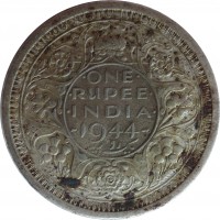 India coin 1 Rupee - George VI (1942 - 1945) reverse reverse of 1 Rupee - George VI (1942 - 1945) coin with KM# 557 from India. Inscription: ONE RUPEE INDIA 1944 یک روپیہ