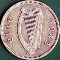 obverse of 1 Shilling (1939 - 1942) coin with KM# 14 from Ireland. Inscription: éire 1942