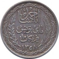 obverse of 10 Francs - Aḥmad II ibn Ali (1939 - 1942) coin with KM# 265 from Tunisia. Inscription: أحمد باشا باى تونس ١٠ فرنكات ١٣٥٨