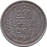 Tunisia coin 10 Francs - Aḥmad II ibn Ali (1939 - 1942) obverse obverse of 10 Francs - Aḥmad II ibn Ali (1939 - 1942) coin with KM# 265 from Tunisia. Inscription: أحمد باشا باى تونس ١٠ فرنكات ١٣٥٨