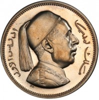 Libya coin 2 Piastres - Idris I (1952) obverse obverse of 2 Piastres - Idris I (1952) coin with KM# 5 from Libya. Inscription: إدريس الأول ملك ليبيا P.V.