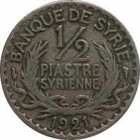 Syria coin 1/2 Piastre (1921) reverse reverse of 1/2 Piastre (1921) coin with KM# 68 from Syria. Inscription: BANQUE DE SYRIE 1/2 PIASTRE SYRIENNE 1921