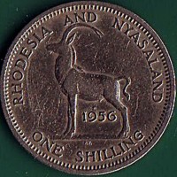 reverse of 1 Shilling - Elizabeth II - 1'st Portrait (1955 - 1957) coin with KM# 5 from Rhodesia and Nyasaland. Inscription: RHODESIA AND NYASALAND 1956 P.V. ONE SHILLING