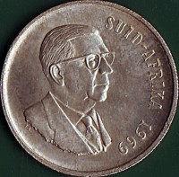 South Africa coin 1 Rand - The end of Dr. Theophilus Ebenhaezer Dönges' Presidency - SUID AFRIKA (1969) obverse obverse of 1 Rand - The end of Dr. Theophilus Ebenhaezer Dönges' Presidency - SUID AFRIKA (1969) coin with KM# 80.2 from South Africa. Inscription: SUID-AFRIKA 1969