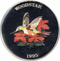 Turks and Caicos Islands coin 25 Crowns - Elizabeth II - Woodstar Bird (1995) reverse reverse of 25 Crowns - Elizabeth II - Woodstar Bird (1995) coin with KM# 211 from Turks and Caicos Islands. Inscription: WOODSTAR 1995