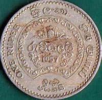 reverse of 1 Rupee - Elizabeth II - 2,500th Anniversary of Buddhism (1957) coin with KM# 125 from Ceylon. Inscription: ONE RUPEE ශ්‍රීලංකා ஒந ரூபாய் රැපියල යි 1957 බුහ ටඨනකි
