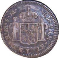 reverse of 1/2 Real - Carlos IV (1790) coin with KM# 71 from Mexico. Inscription: HISPAN *ET* IND * R * M * FM