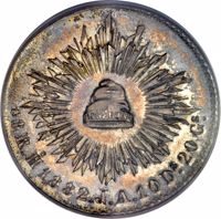 Mexico coin 8 Reales (1882) reverse reverse of 8 Reales (1882) coin with KM# Pn136a from Mexico. Inscription: *8R.Ho 1882.J.A.10Ds.20Gs.