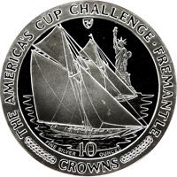 reverse of 10 Crowns - Elizabeth II - Sailboats and Statue of Liberty (1987) coin with KM# 181 from Isle of Man. Inscription: THE AMERICA'S CUP CHALLENGE·FREEMANTLE FINE SILVER 10 OUNCES CROWNS