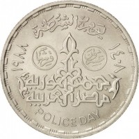 reverse of 20 Piasters - Police Day (1988) coin with KM# 646 from Egypt. Inscription: الشرطة عشرون قرشاً ١٤٠٨ ١٩٨٨ جمهورية مصر العربية POLICE DAY