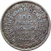 reverse of 100 Francs - Mohammed V (1953) coin with Y# 52 from Morocco. Inscription: MAROC EMPIRE CHERIFIEN 100 FRANCS AN 1953 1372 J.HAINAUT