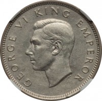 New Zealand coin 1 Shilling - George VI (1937 - 1946) obverse obverse of 1 Shilling - George VI (1937 - 1946) coin with KM# 9 from New Zealand. Inscription: GEORGE VI KING EMPEROR