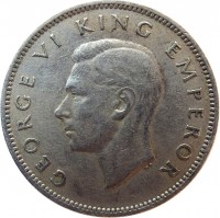 New Zealand coin 1 Shilling - George VI (1947) obverse obverse of 1 Shilling - George VI (1947) coin with KM# 9a from New Zealand. Inscription: GEORGE VI KING EMPEROR