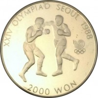 Korea coin 2000 Won - Boxing (1986) reverse reverse of 2000 Won - Boxing (1986) coin with KM# 50 from Korea. Inscription: XXIV OLYMPIAD SEOUL 1988 2000 WON