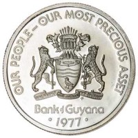 obverse of 25 Cents - 10th Anniversary of Independence: Harpy Self Determination (1976 - 1980) coin with KM# 40 from Guyana. Inscription: OUR PEOPLE - OUR MOST PRECIOUS ASSET ONE PEOPLE ONE NATION ONE DESTINY FM Bank of Guyana · 1977 ·