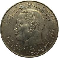 Tunisia coin 1/2 Dinar (1968) obverse obverse of 1/2 Dinar (1968) coin with KM# 291 from Tunisia. Inscription: الحبيب برقيبة رئيس الجمهورية التونسية