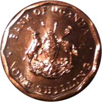 Uganda coin 1 Shilling (1987) obverse obverse of 1 Shilling (1987) coin with KM# 27 from Uganda. Inscription: · BANK OF UGANDA · FOR GOD AND MY COUNTRY ONE SHILLING