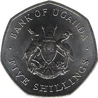 Uganda coin 5 Shillings (1987) obverse obverse of 5 Shillings (1987) coin with KM# 29 from Uganda. Inscription: · BANK OF UGANDA · FOR GOD AND MY COUNTRY FIVE SHILLINGS