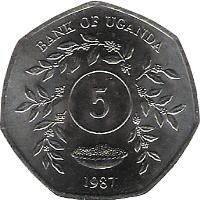 Uganda coin 5 Shillings (1987) reverse reverse of 5 Shillings (1987) coin with KM# 29 from Uganda. Inscription: BANK OF UGANDA 5 1987