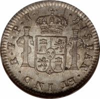 Bolivia coin 1/2 Real - Fernando VII - Colonial Milled Coinage (1814 - 1825) reverse reverse of 1/2 Real - Fernando VII - Colonial Milled Coinage (1814 - 1825) coin with KM# 90 from Bolivia. Inscription: HISPAN.ET IND. R. PTS. P. J.