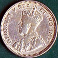 obverse of 25 Cents - George V (1920) coin with KM# 15 from British East Africa. Inscription: GEORGIVS V REX ET IND:IMP: B.M