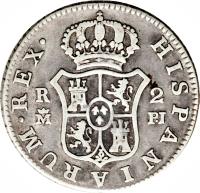 reverse of 2 Reales - Carlos III (1772 - 1788) coin with KM# 412 from Spain. Inscription: HISPANIARUM · REX · R 2 M DV