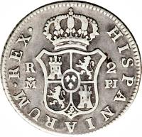 Spain coin 2 Reales - Carlos III (1772 - 1788) reverse reverse of 2 Reales - Carlos III (1772 - 1788) coin with KM# 412 from Spain. Inscription: HISPANIARUM · REX · R 2 M DV