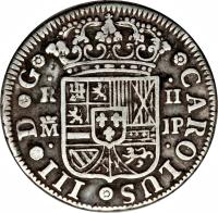 Spain coin 2 Reales - Carlos III (1759 - 1771) obverse obverse of 2 Reales - Carlos III (1759 - 1771) coin with KM# 388 from Spain. Inscription: CAROLUS III D G R II M PJ